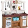 Step2 Fun with Friends Kids Kitchen Playset, Indoor/Outdoor Kitchenette, Interactive Play with Lights and Sounds, Durable Plastic, Includes 25 Piece Toy Accessories, Toddlers 2+ Years Old, Pink - Image 1