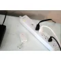 5 ft. 6-Outlet 1080-Joule Surge Protector Power Strip with Remote Control and Safety Covers - Image 4