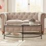 Bella Large Oval Antique Bronze Metal and Glass Coffee Table with Shelf (46 in. W x 18 in. H) - Image 1