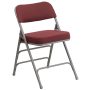 Hercules Series Premium Curved Triple Braced & Double Hinged Navy Fabric Upholstered Metal Folding Chair - Image 1