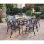 HOMESTYLES Sanibel Rust Bronze 7-pc Cast Aluminum Outdoor Dining Set - Image 1