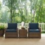 Crosley Bradenton 3-pc Wicker Outdoor Conversation Set with Navy Cushions - 2 Arm Chairs and Side Table - Image 1