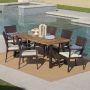 Noble House 7-Piece Plastic, Wood and Iron Rectangular Outdoor Dining Set with Cream Cushion - Image 1