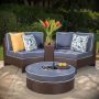 Noble House 4-Piece Faux Rattan Outdoor Patio Sectional Seating Set with Navy Blue Cushions - Image 1